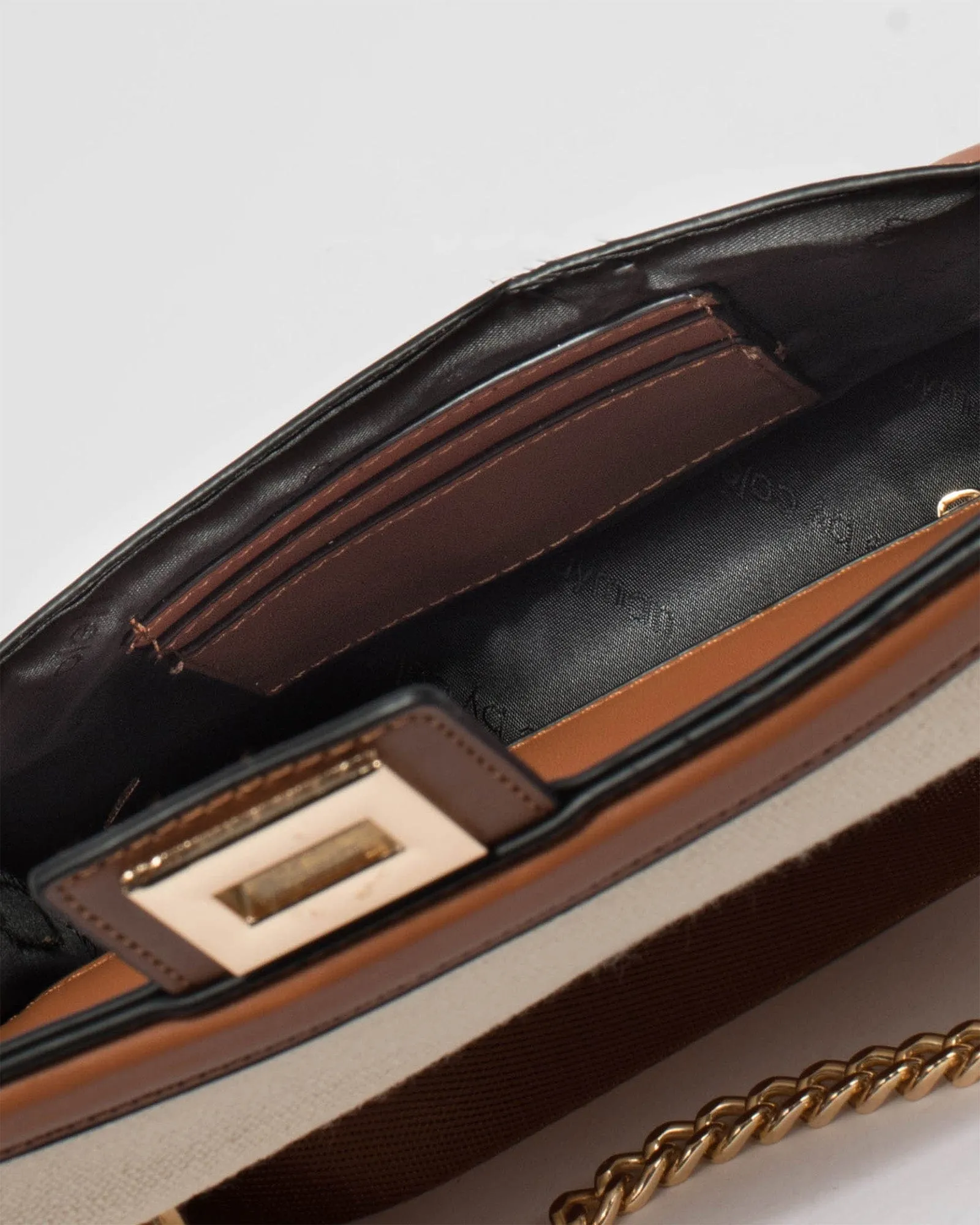 Ari Lock Crossbody Bag