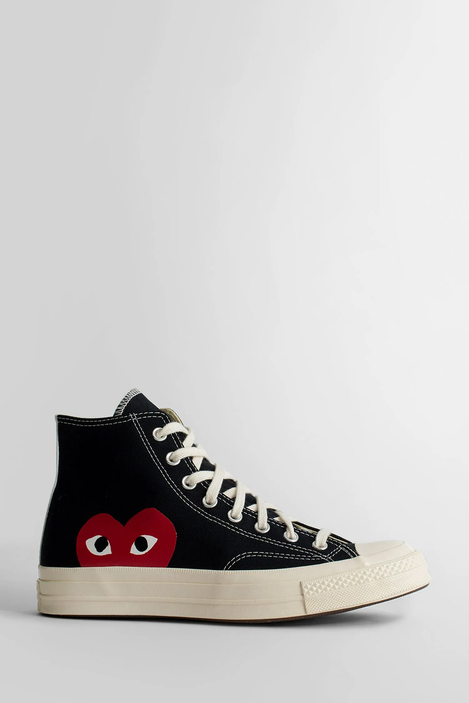 comme des garçons play chuck taylor hi sneakers