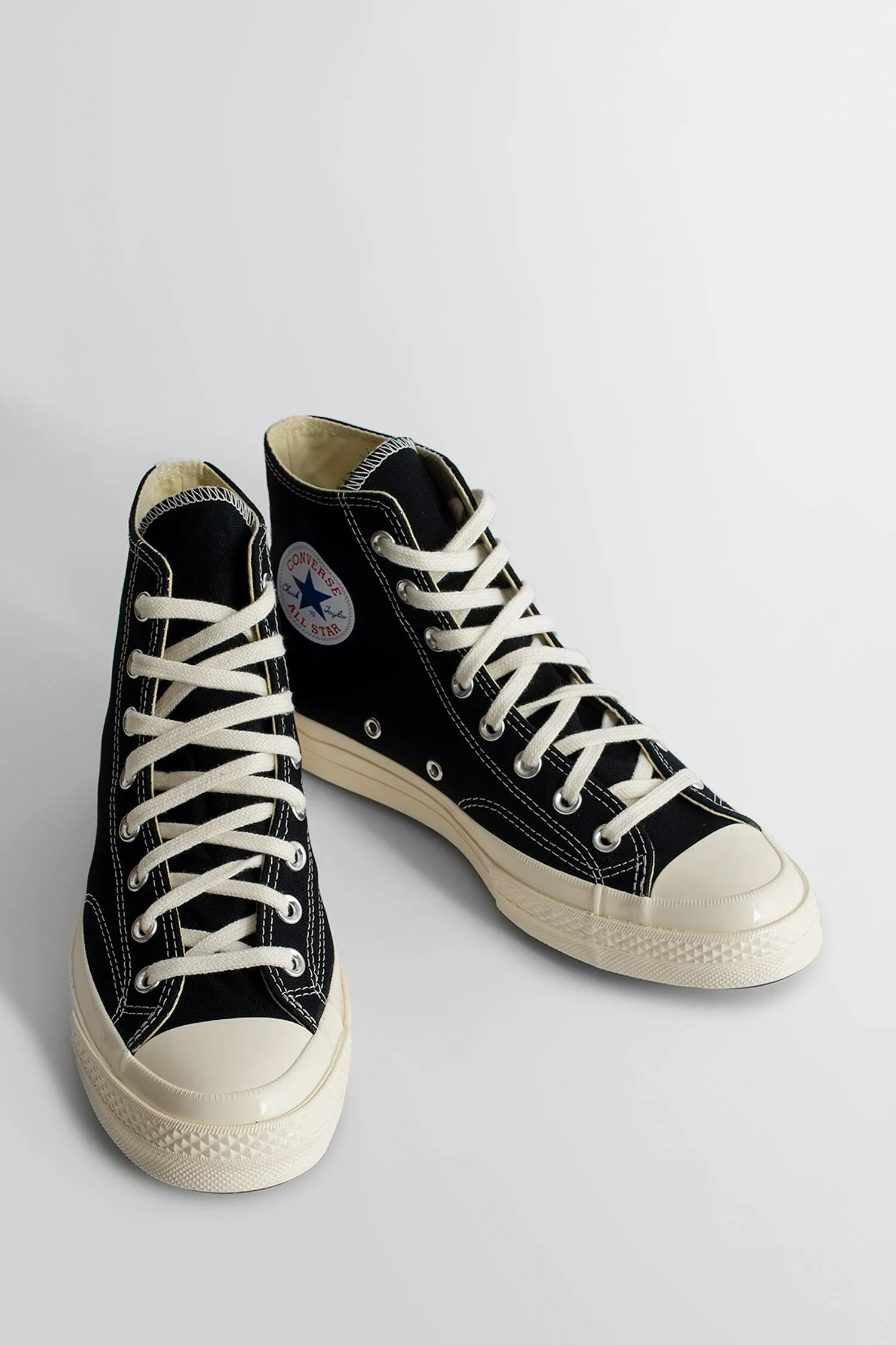 comme des garçons play chuck taylor hi sneakers