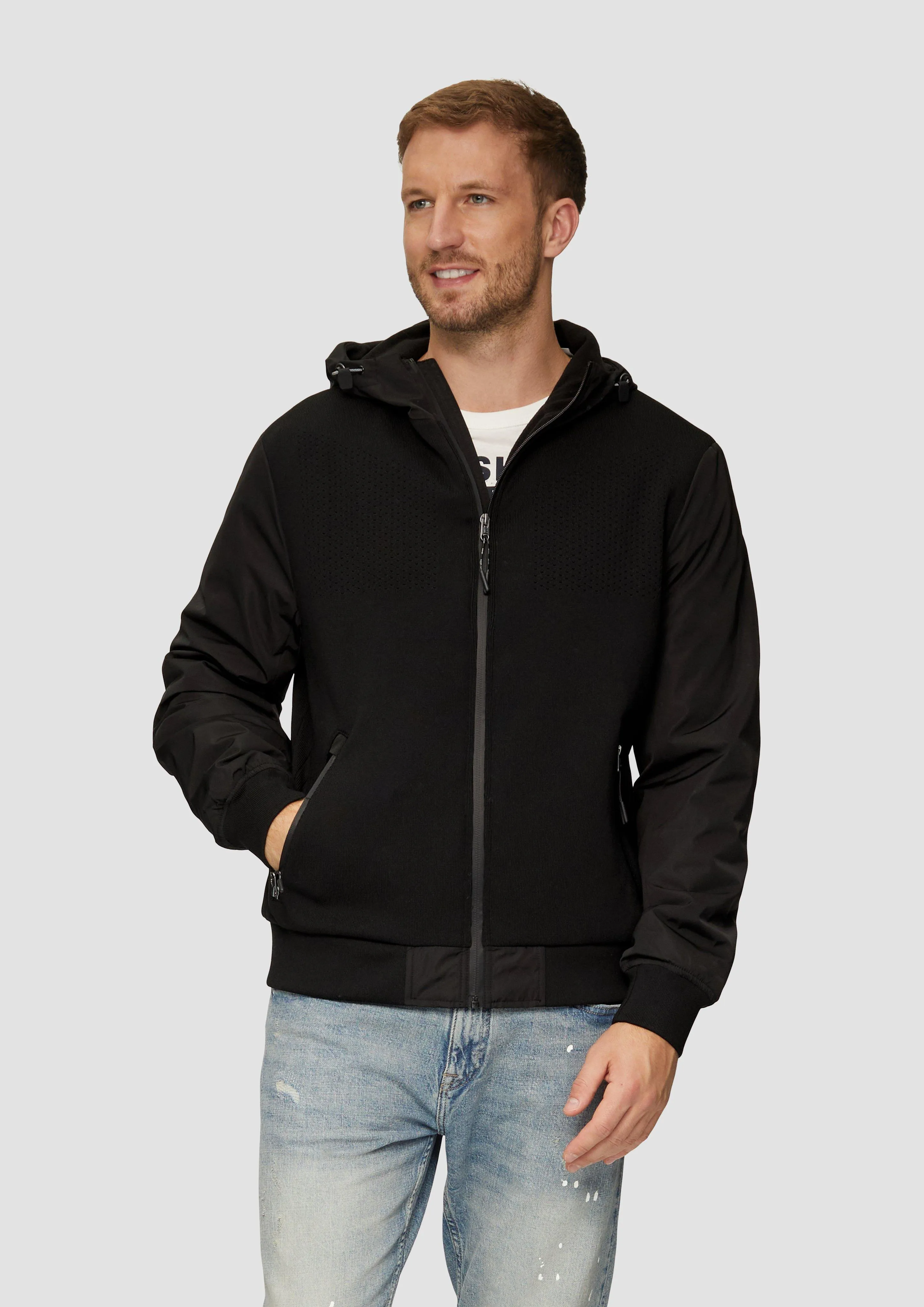 Hooded jacket with an innovative mix of materials
