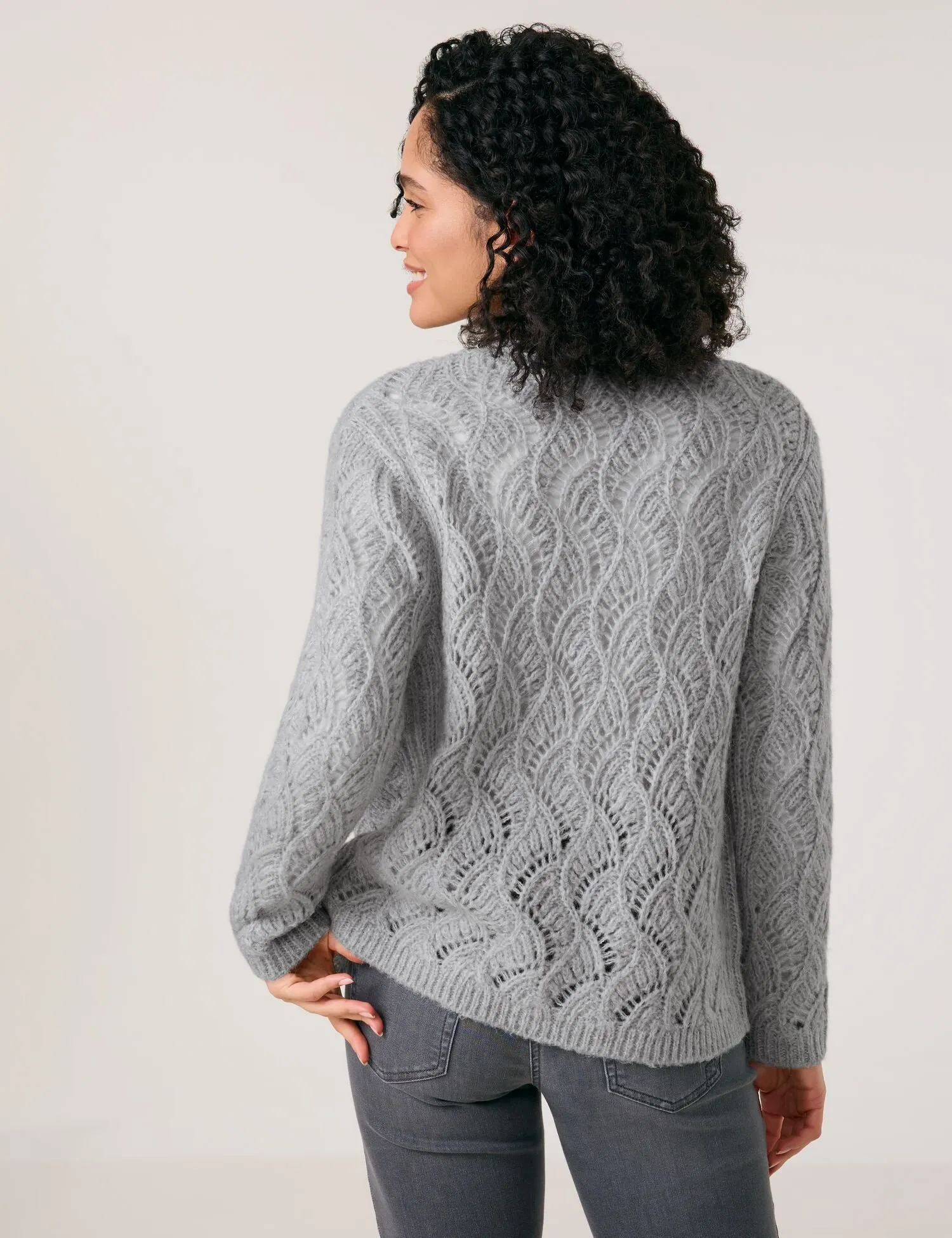 Open cardigan in an openwork knit