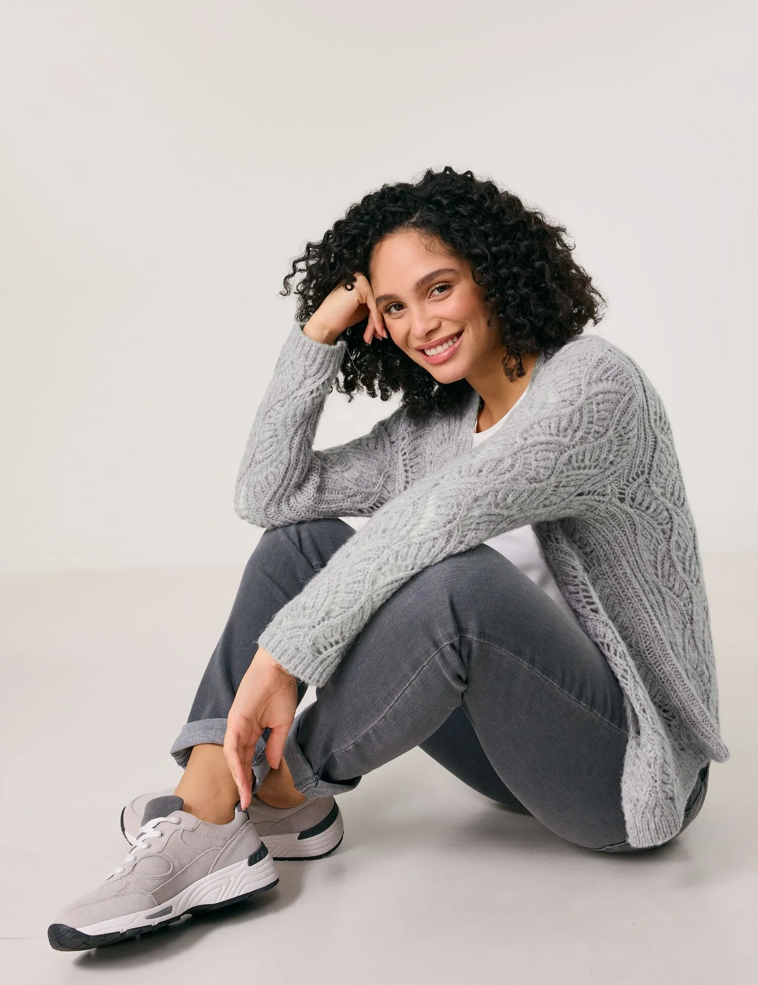 Open cardigan in an openwork knit