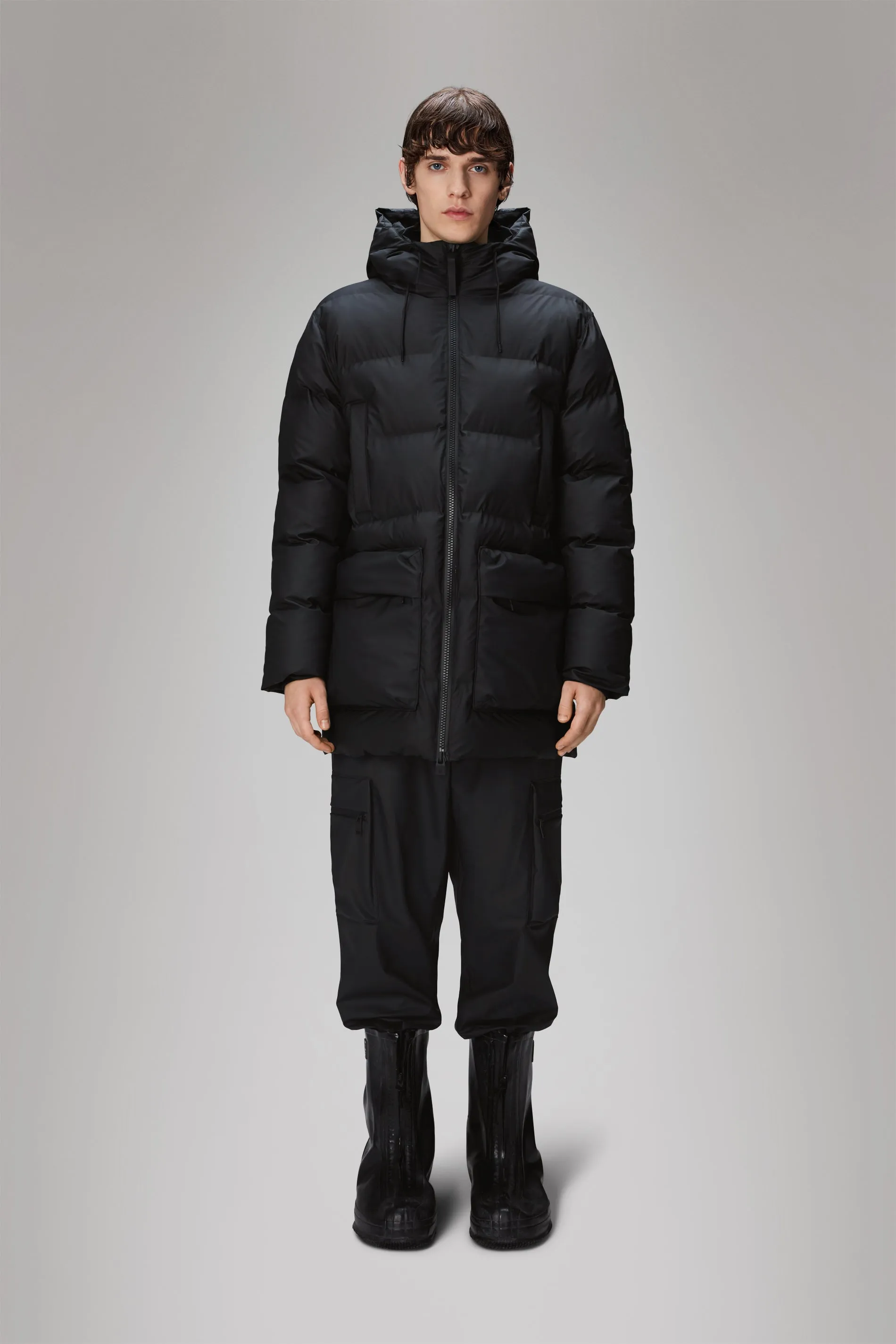 Rains® Alta Long Puffer Cargo Jacket in Black for €399 | 2-Year Warranty