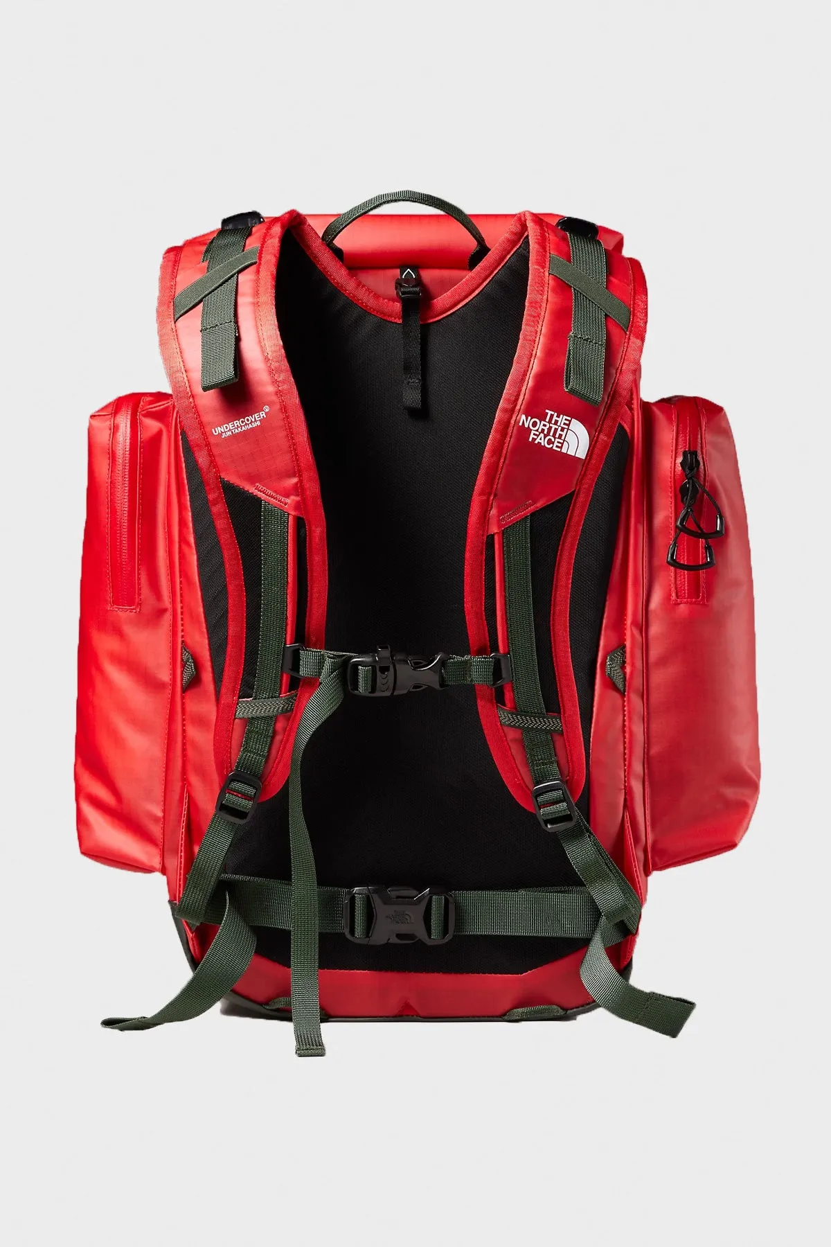 TNF x Undercover Soukuu Backpack - Dark Cedar Green/High Risk Red